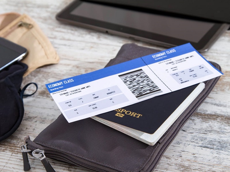 Passagem aérea e passaporte para uma viagem na África do Sul